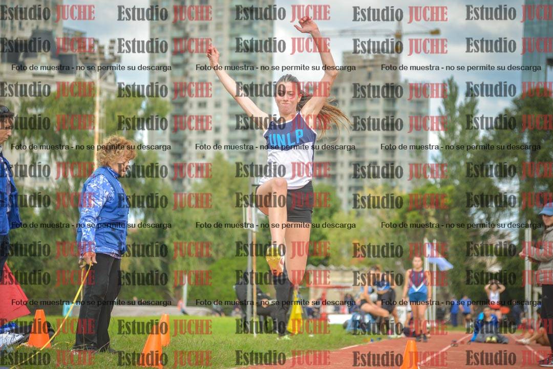 Fotos del salto en largo - mujeres mayores