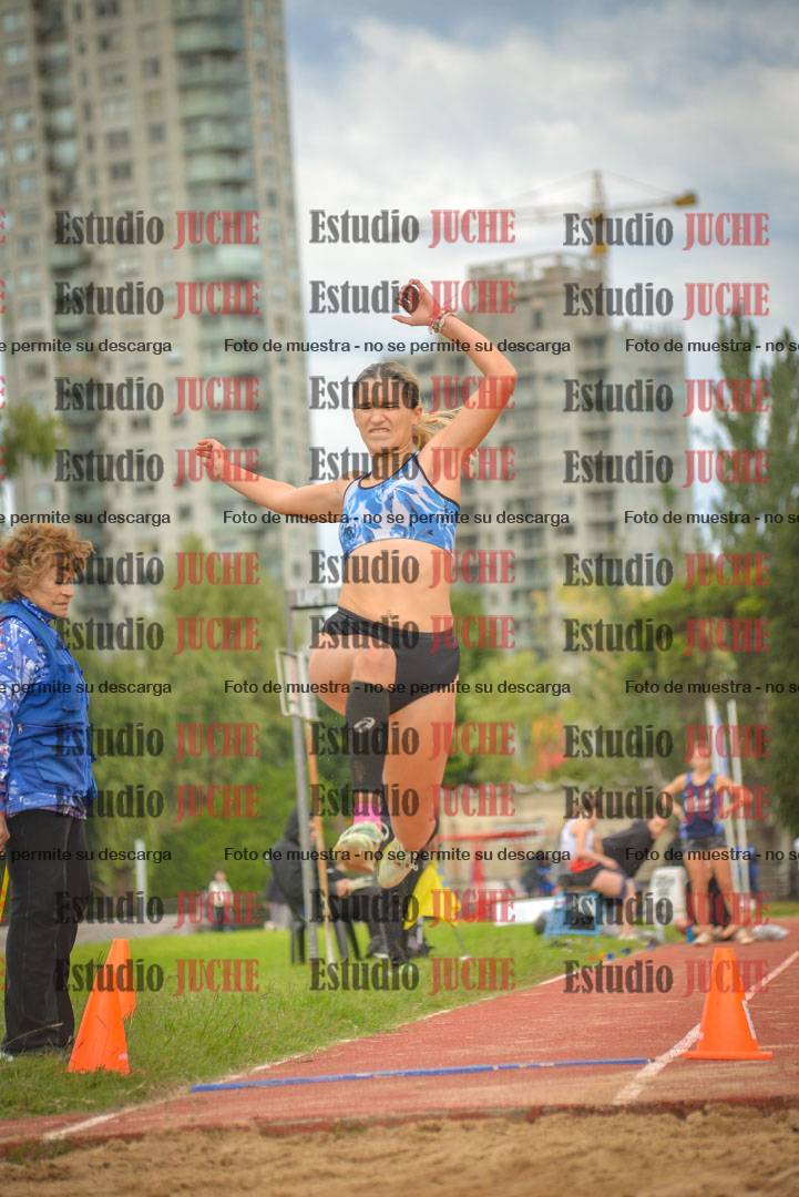 Fotos del salto en largo - mujeres mayores