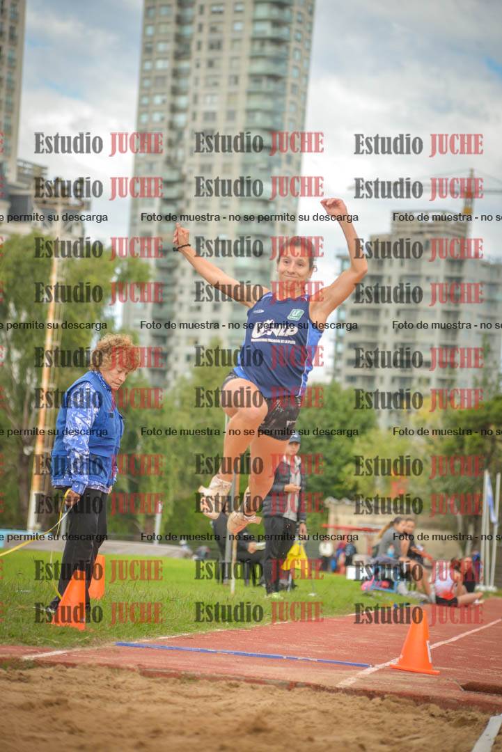 Fotos del salto en largo - mujeres mayores