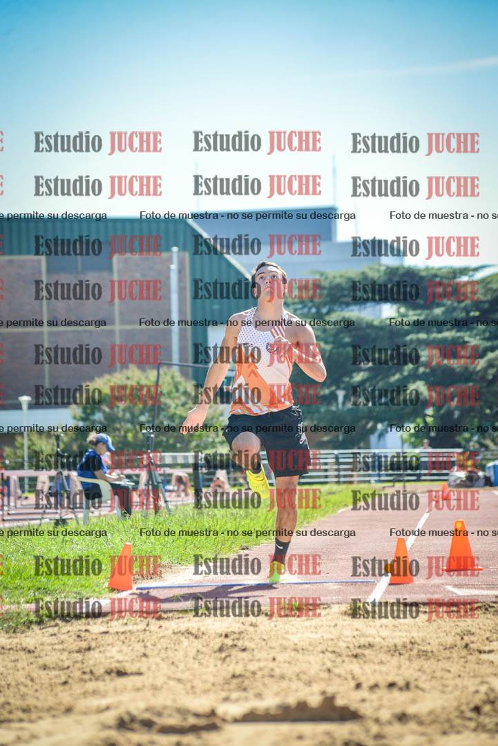 Fotos del salto en largo de varones
