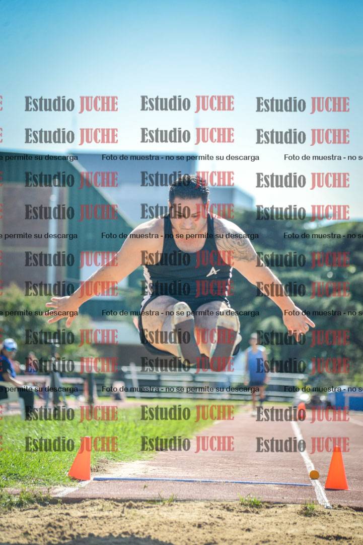 Fotos del salto en largo de varones