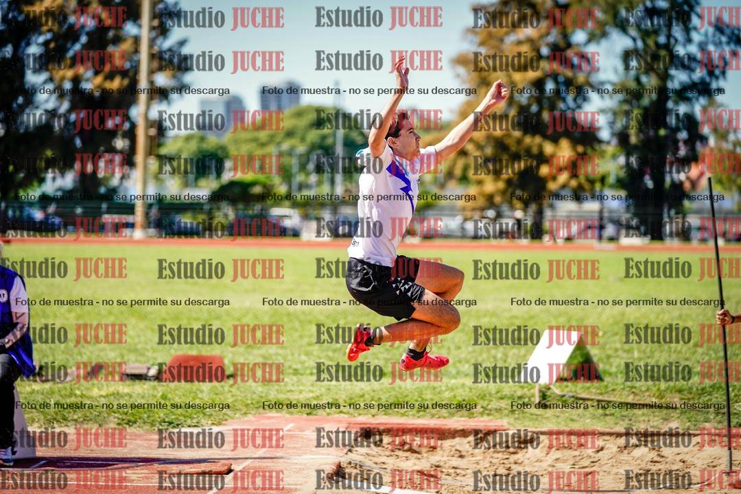 Fotos del salto en largo de varones