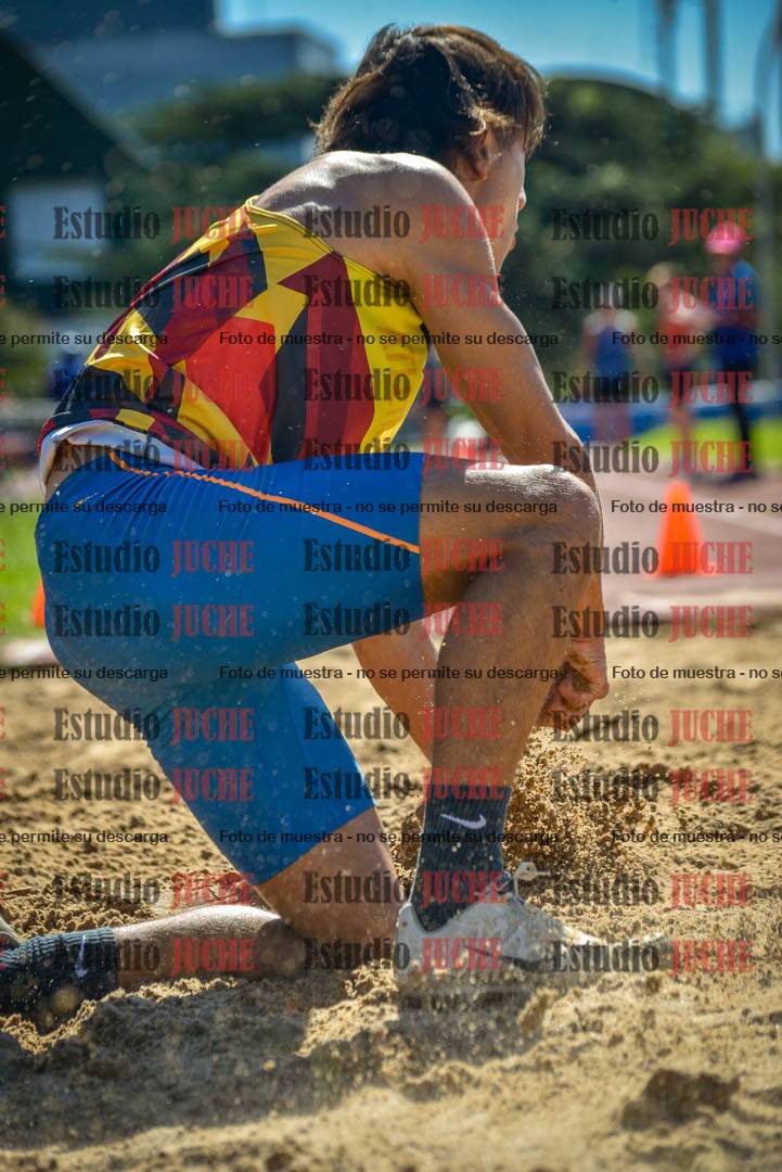 Fotos del salto en largo de varones
