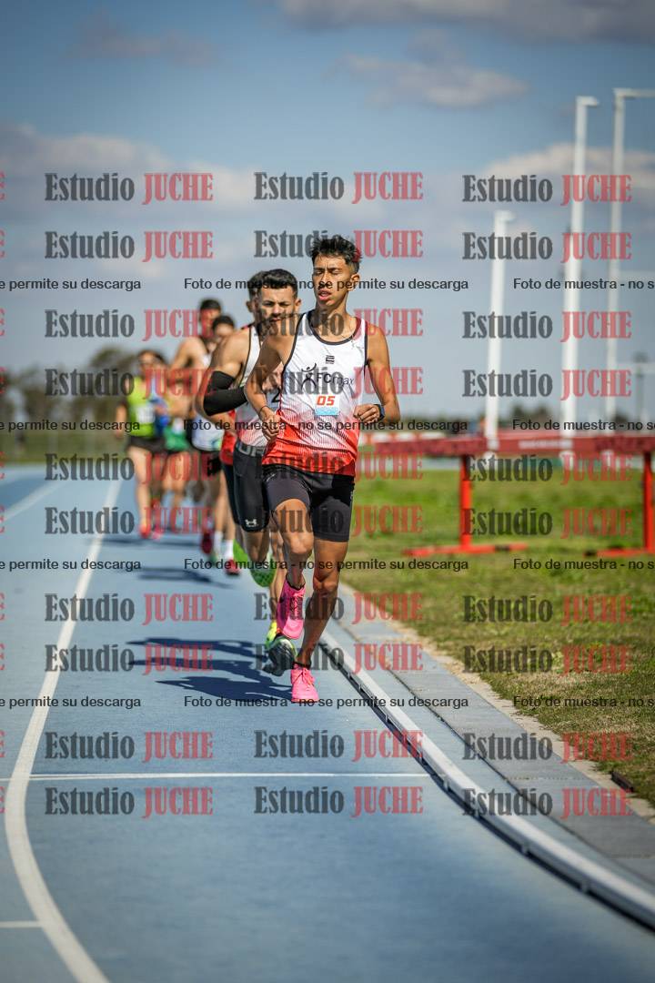 Fotos de los 5000 m llanos de mujeres y varones