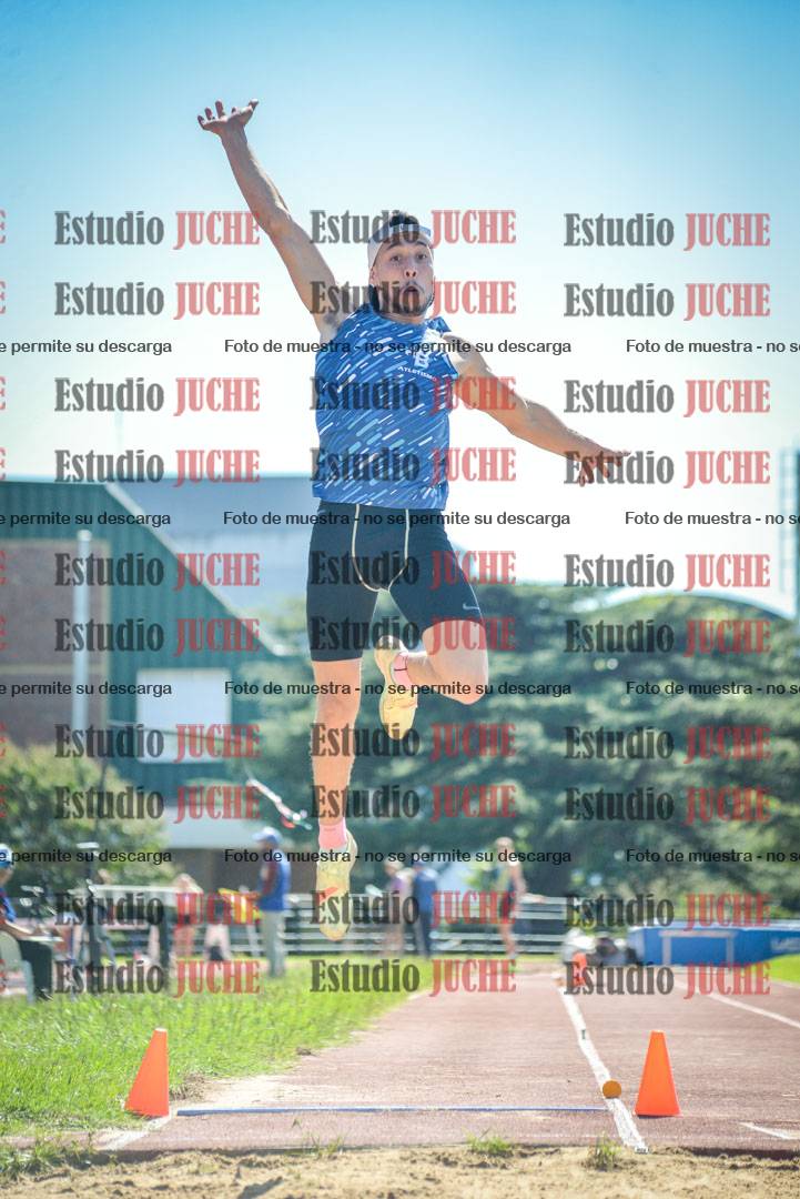 Fotos del salto en largo de varones