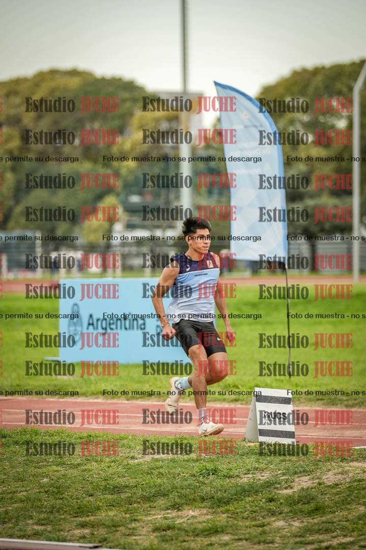 Fotos del salto en largo de varones