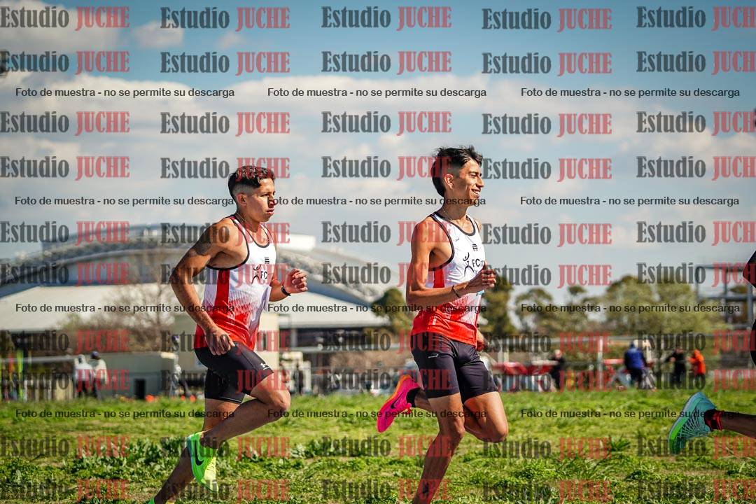 Fotos de los 5000 m llanos de mujeres y varones