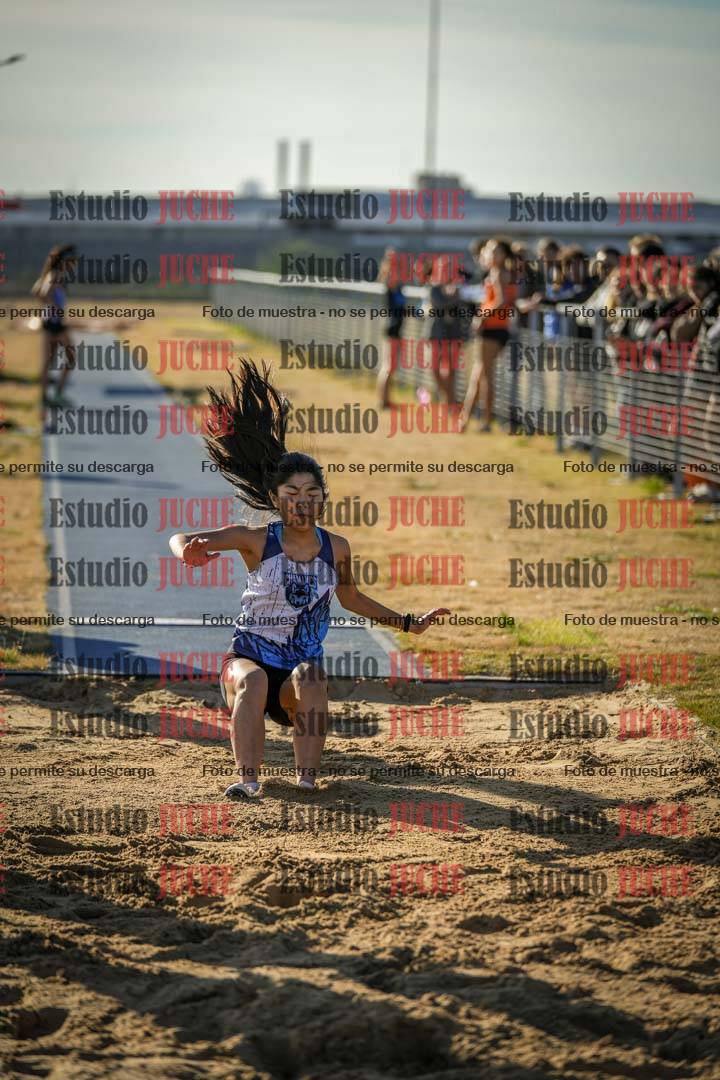 Fotos del salto en largo de mujeres
