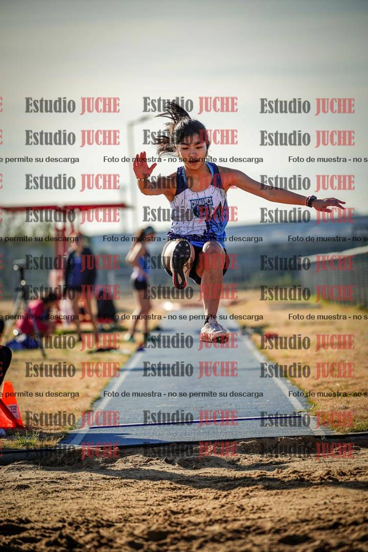 Fotos del salto en largo de mujeres