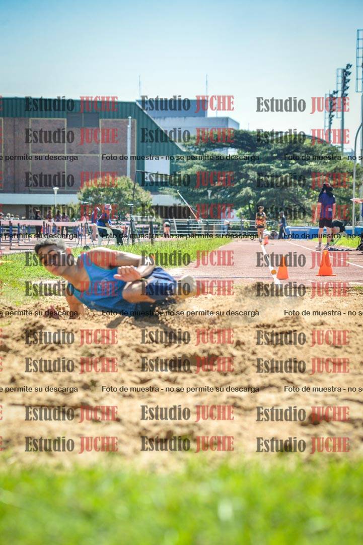 Fotos del salto en largo de varones
