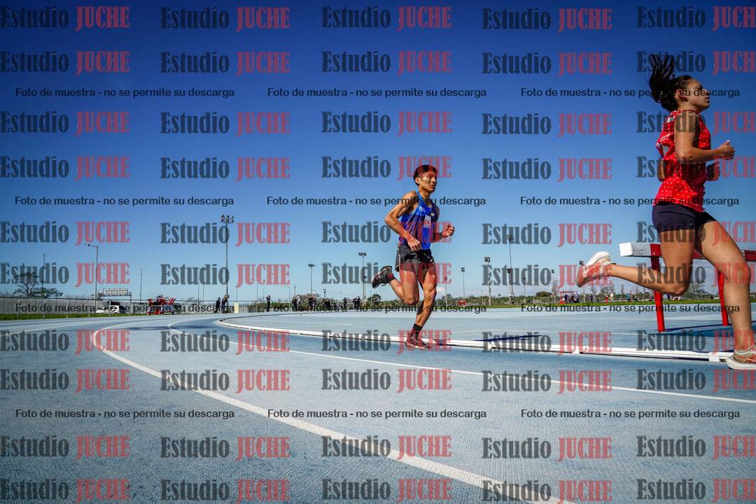Fotos de los 5000 m llanos de mujeres y varones