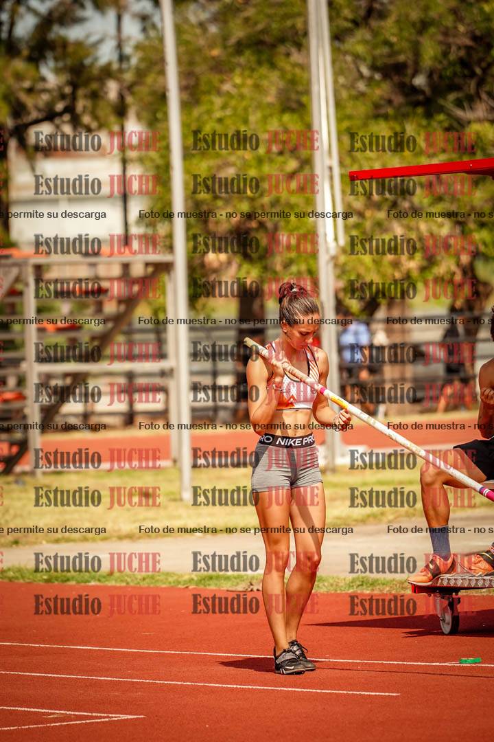 Fotos del salto con garrocha de mujeres y varones