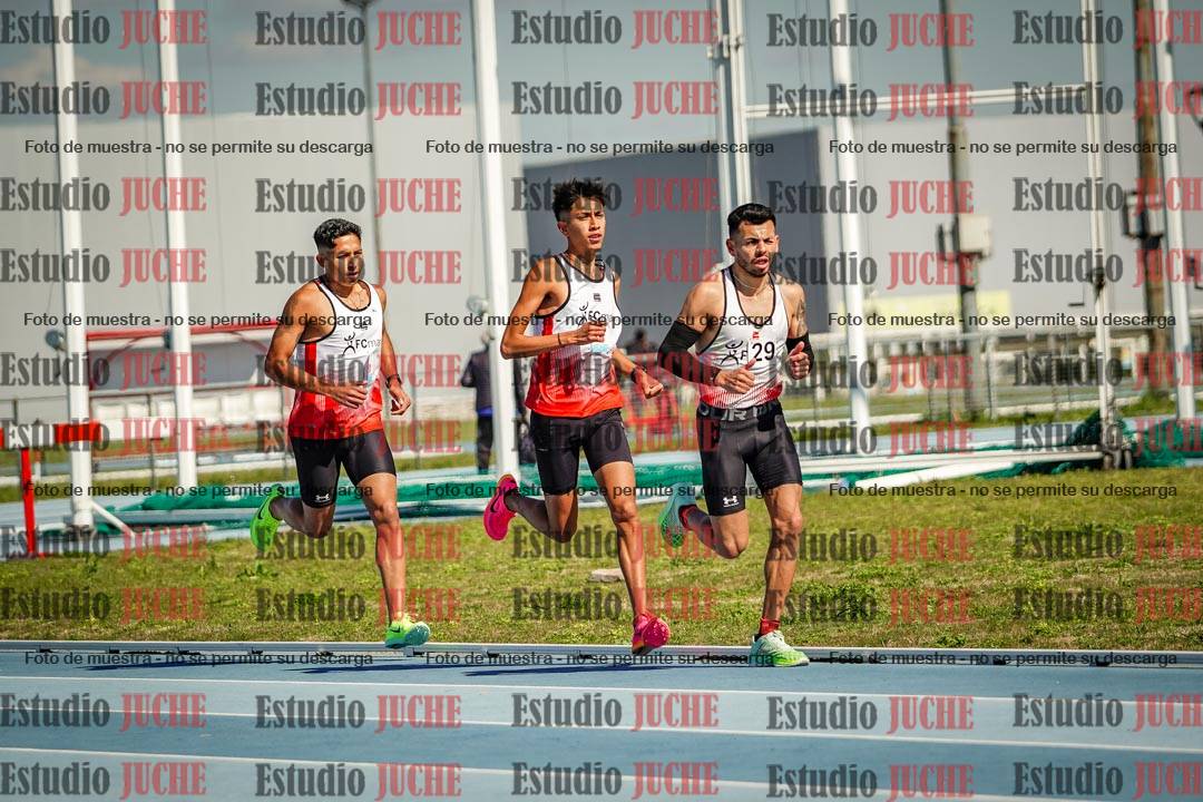 Fotos de los 5000 m llanos de mujeres y varones