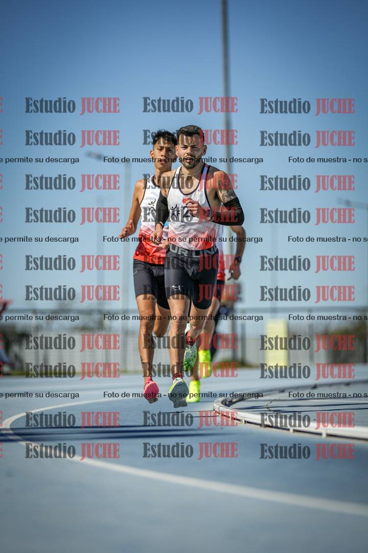 Fotos de los 5000 m llanos de mujeres y varones