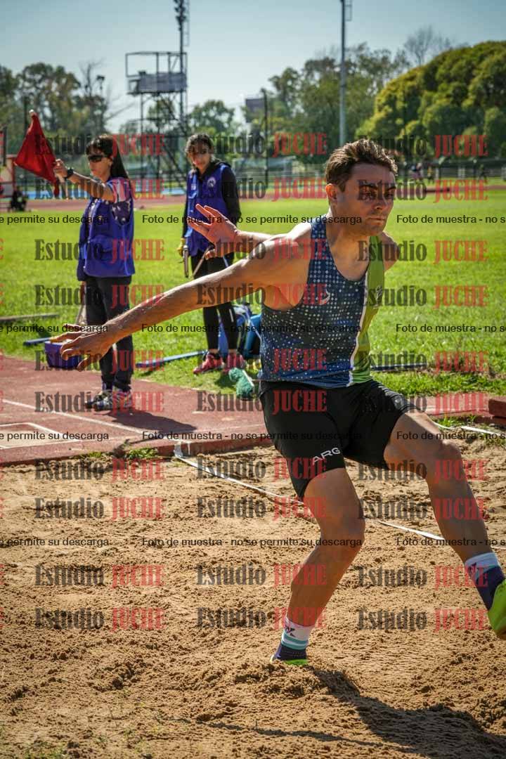 Fotos del salto en largo de varones