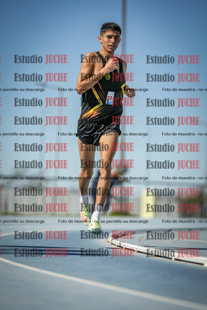 Fotos de los 5000 m llanos de mujeres y varones