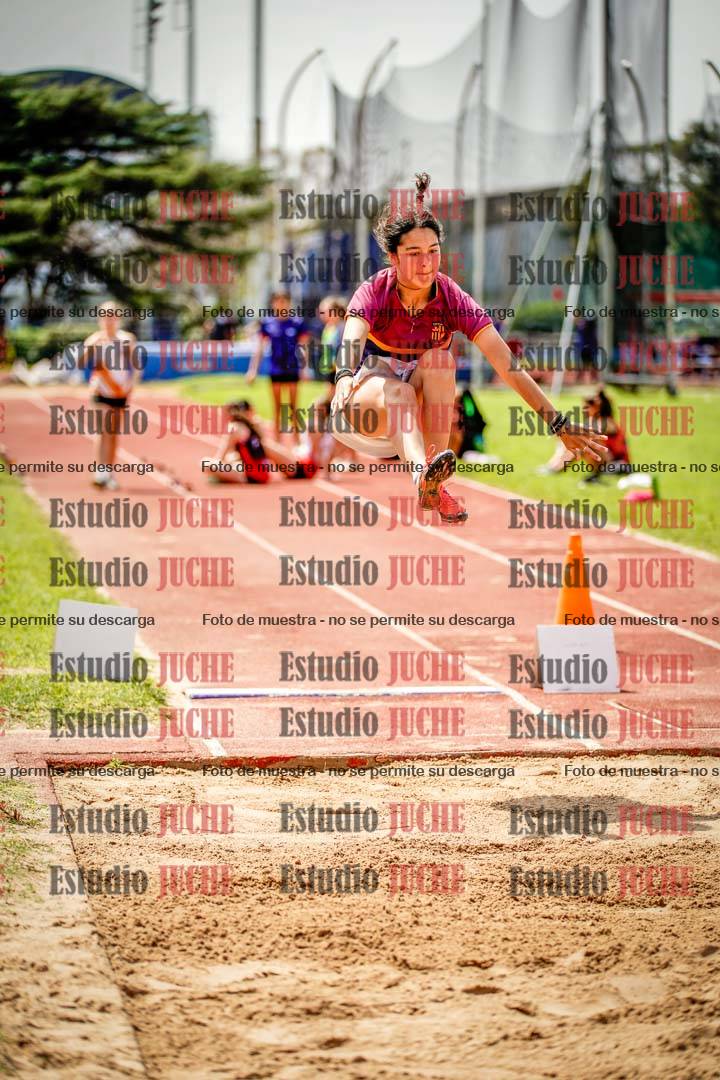 Fotos del salto en largo de mujeres