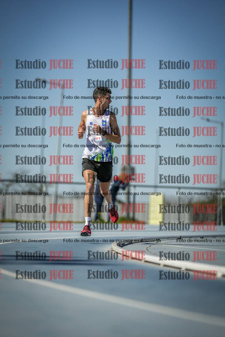 Fotos de los 5000 m llanos de mujeres y varones