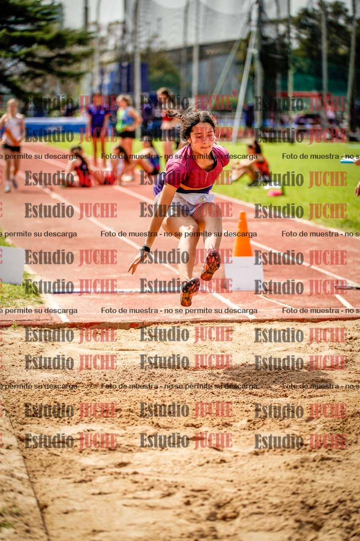Fotos del salto en largo de mujeres