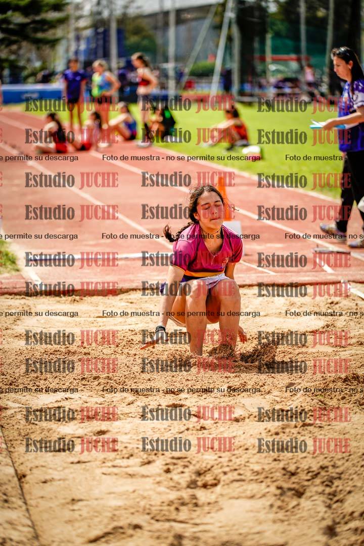 Fotos del salto en largo de mujeres