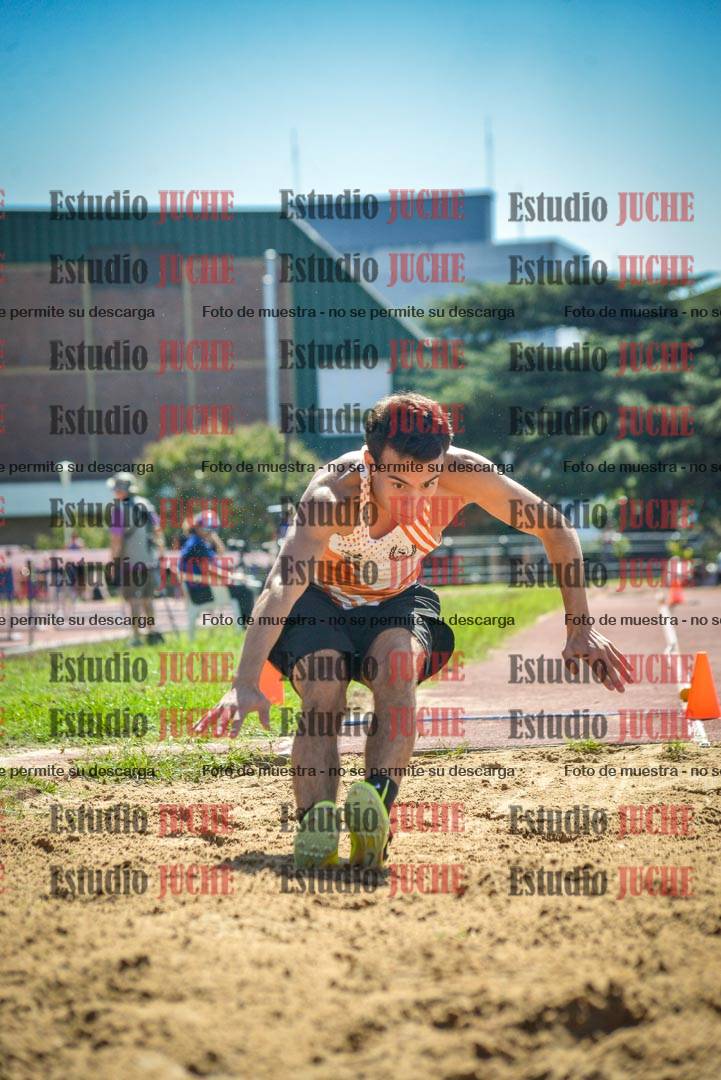 Fotos del salto en largo de varones