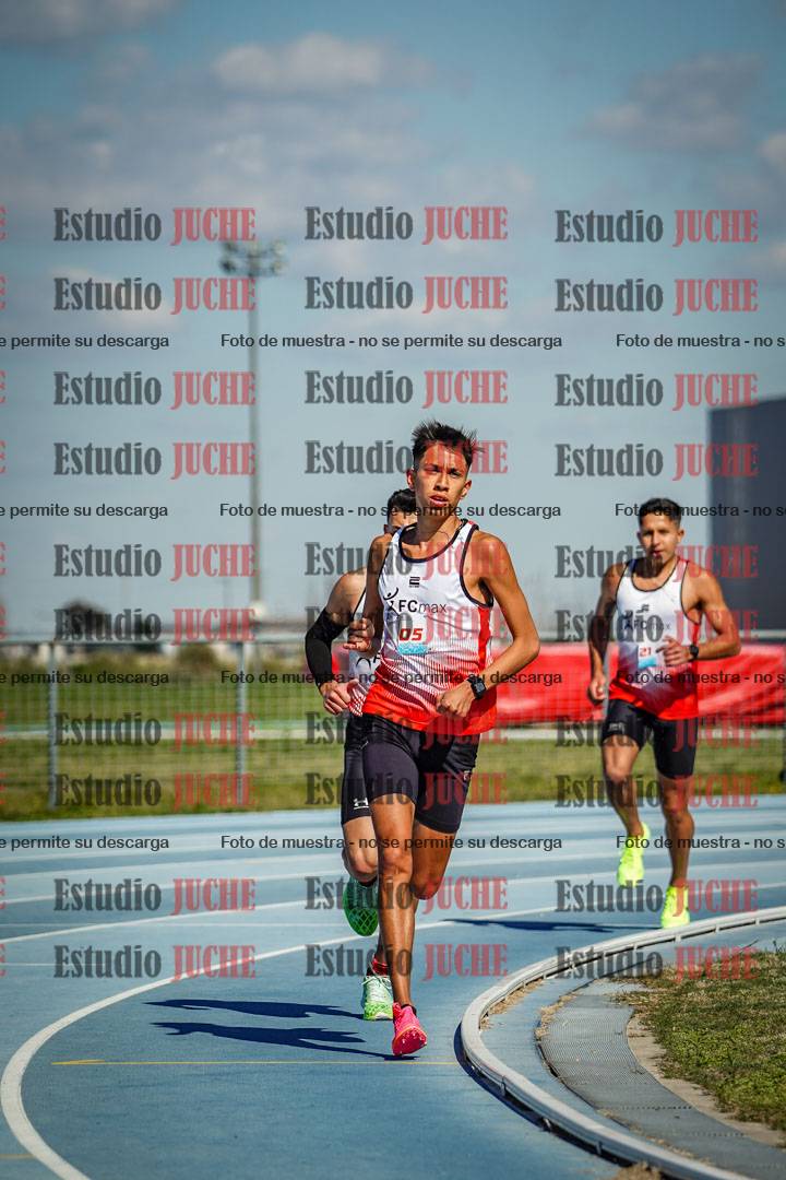 Fotos de los 5000 m llanos de mujeres y varones