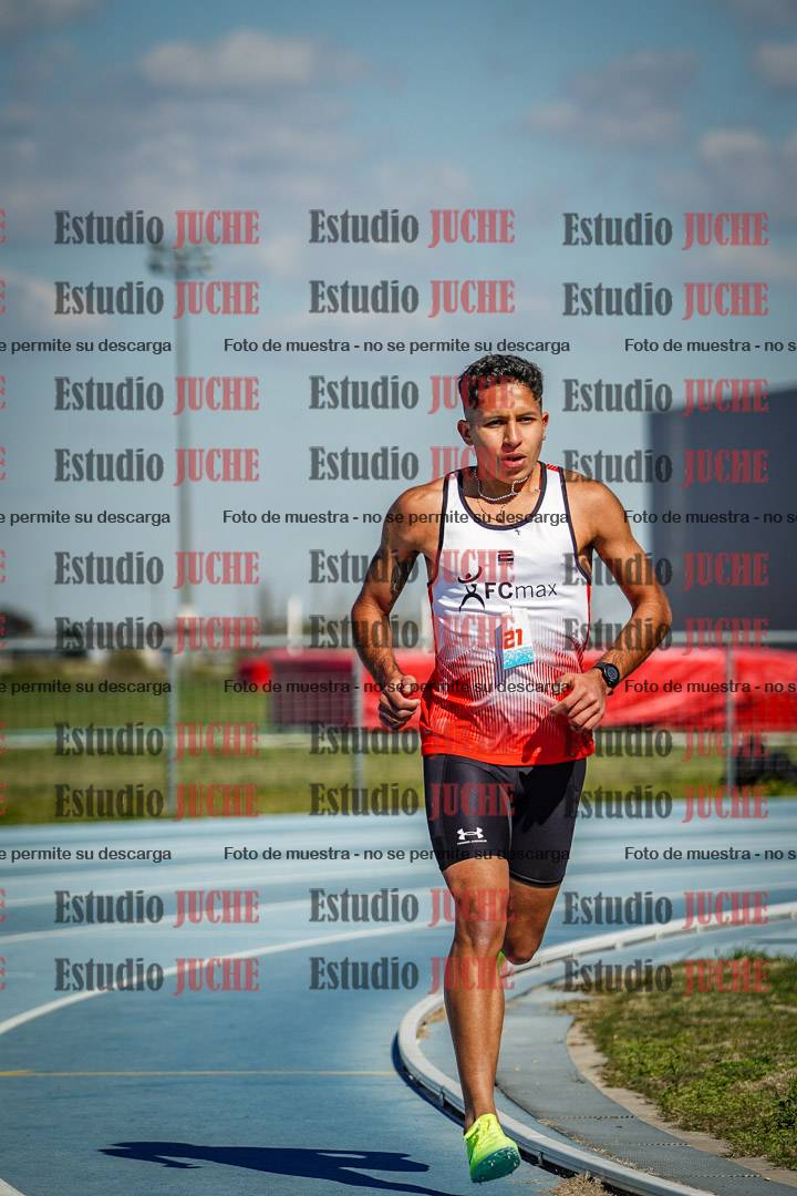 Fotos de los 5000 m llanos de mujeres y varones