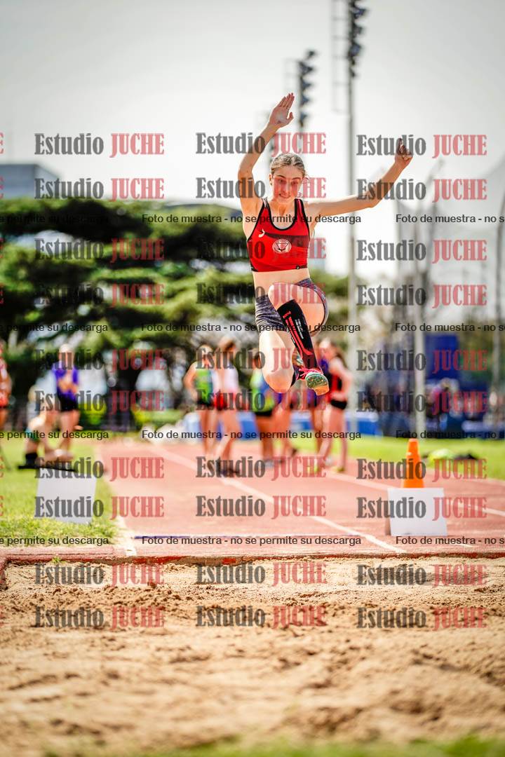 Fotos del salto en largo de mujeres