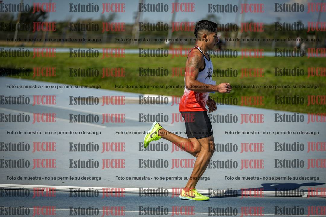 Fotos de los 5000 m llanos de mujeres y varones