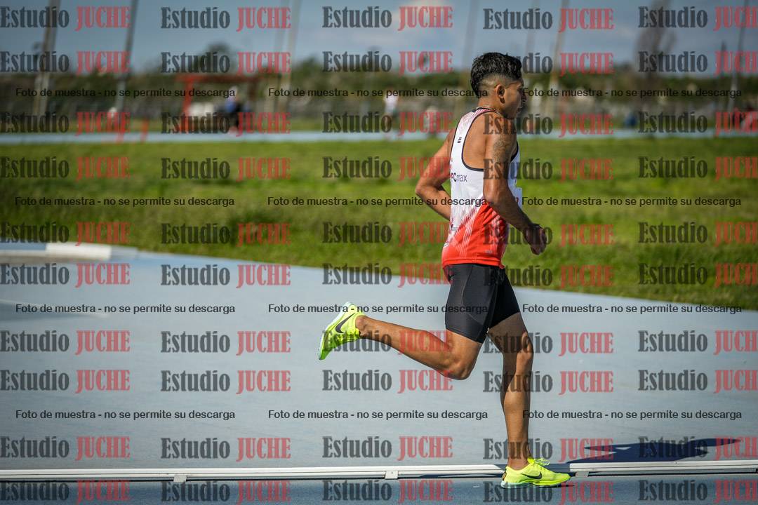 Fotos de los 5000 m llanos de mujeres y varones