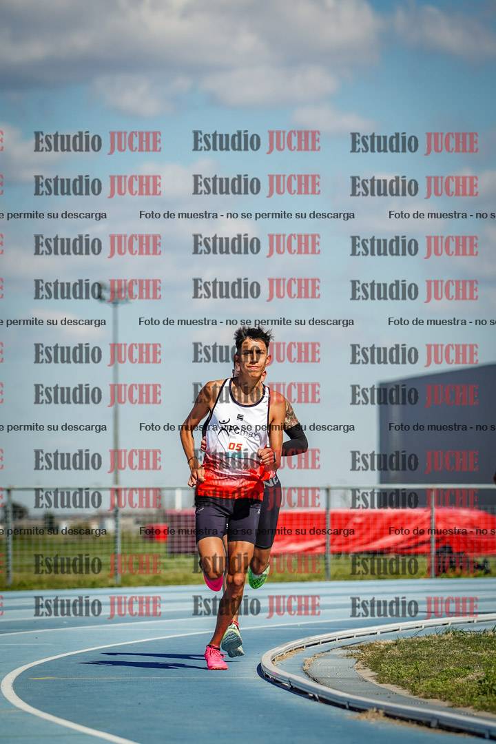Fotos de los 5000 m llanos de mujeres y varones