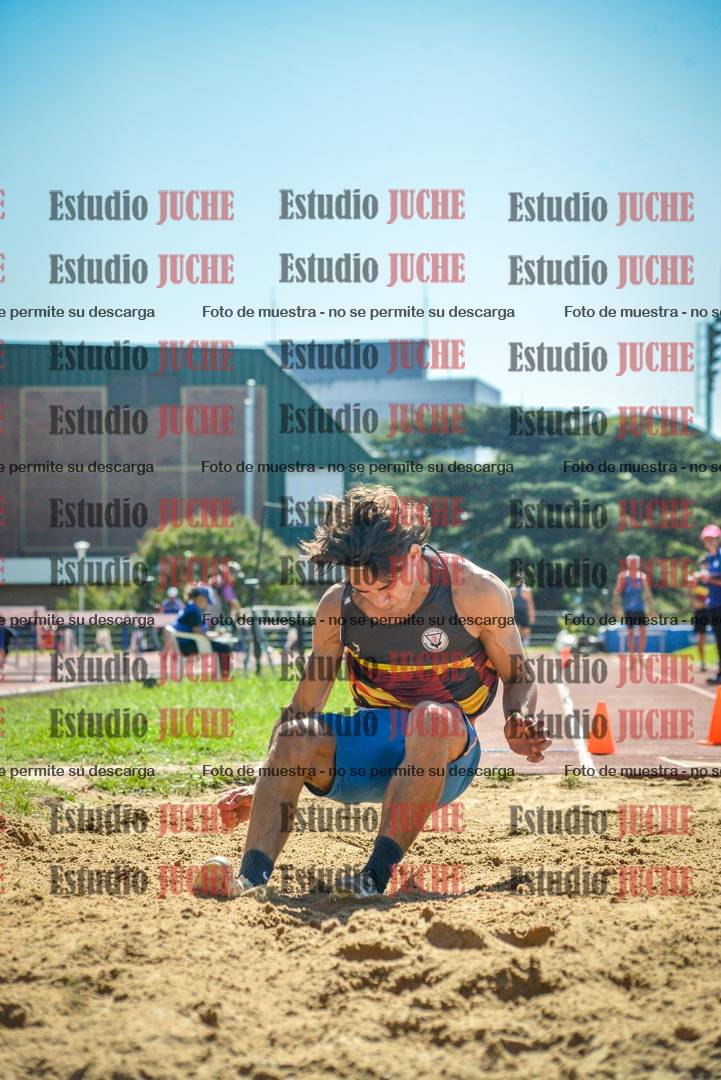 Fotos del salto en largo de varones