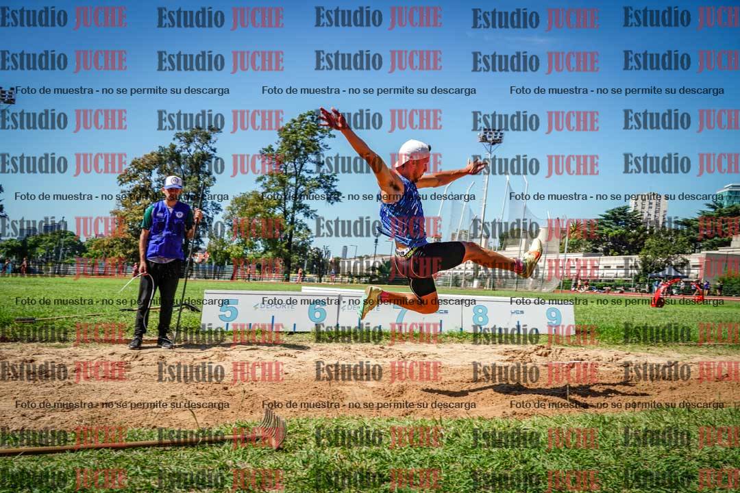 Fotos del salto en largo de varones