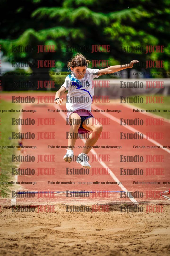 Fotos del salto en largo de mujeres