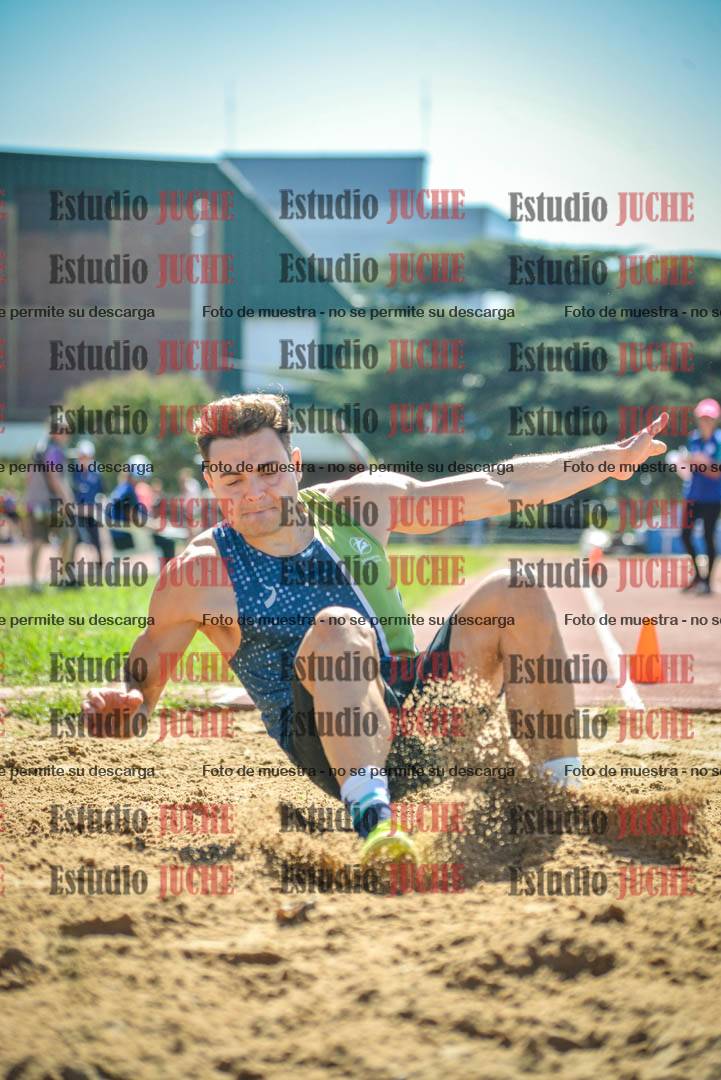 Fotos del salto en largo de varones