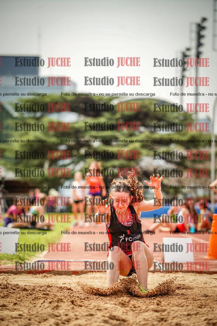 Fotos del salto en largo de mujeres