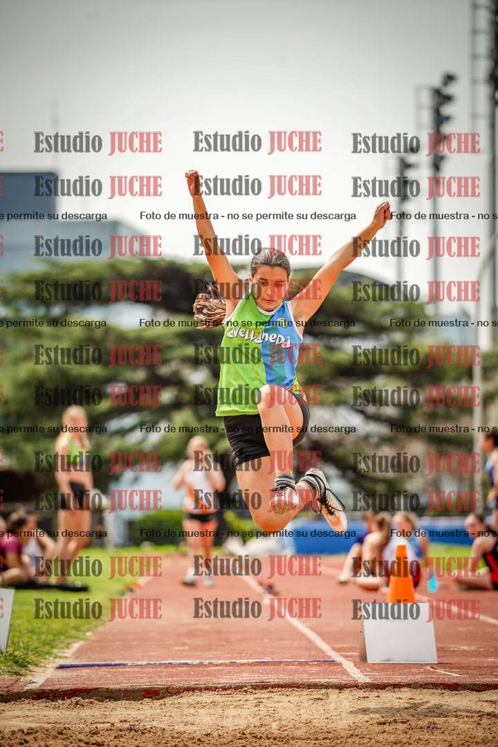 Fotos del salto en largo de mujeres