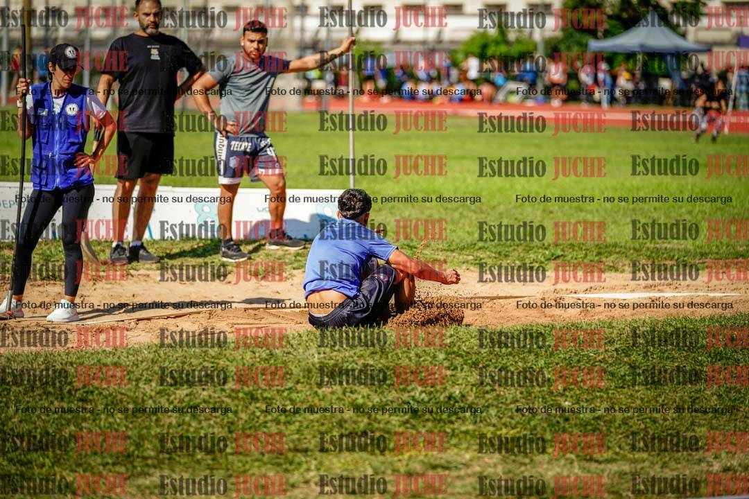 Fotos del salto en largo de varones