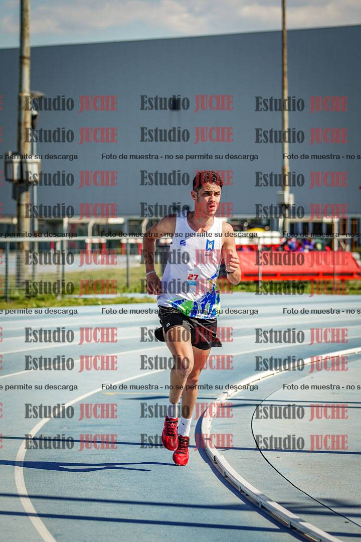 Fotos de los 5000 m llanos de mujeres y varones