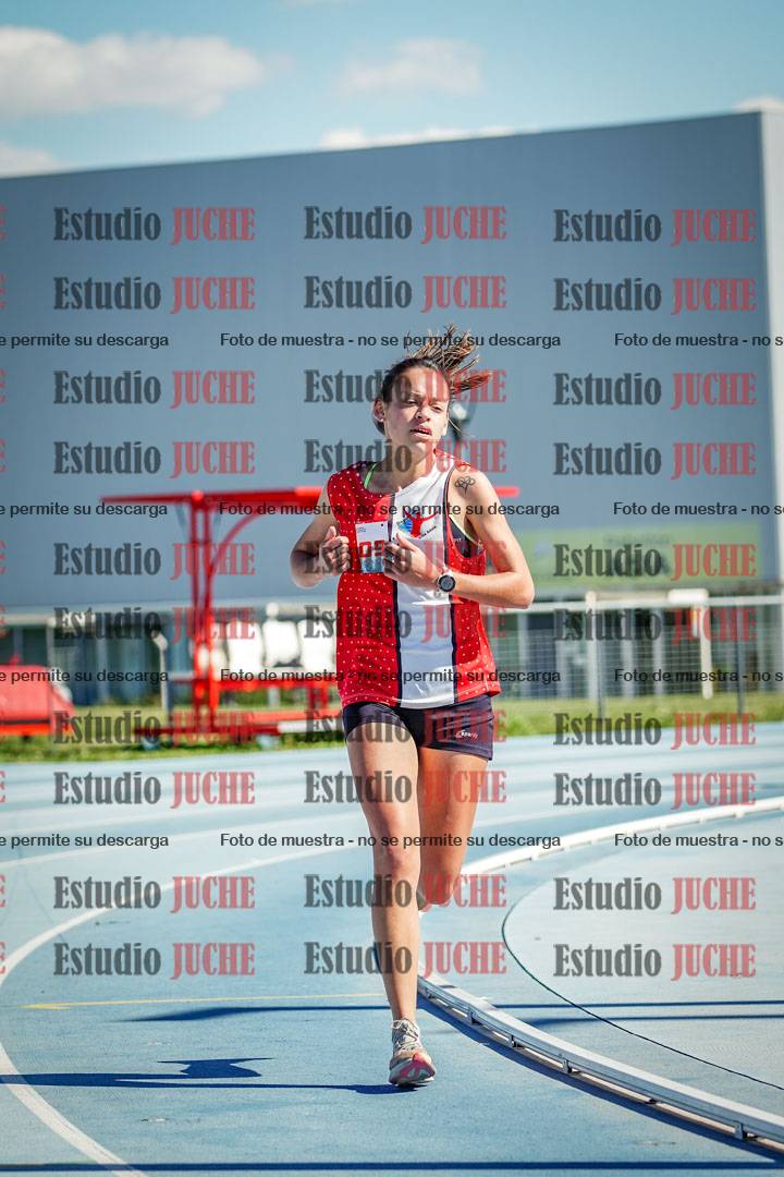 Fotos de los 5000 m llanos de mujeres y varones