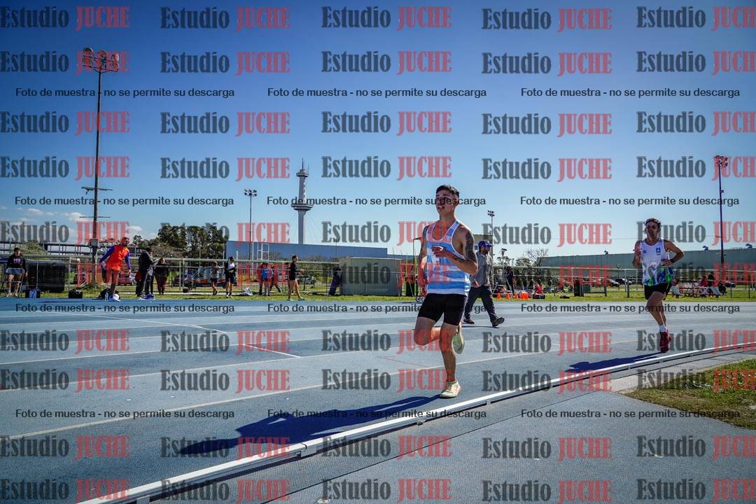 Fotos de los 5000 m llanos de mujeres y varones