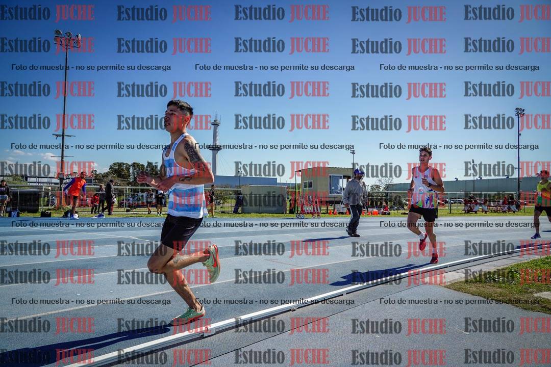 Fotos de los 5000 m llanos de mujeres y varones