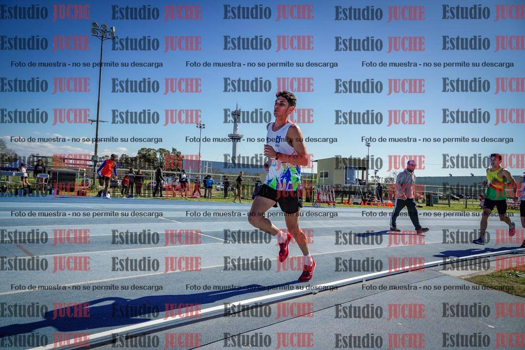 Fotos de los 5000 m llanos de mujeres y varones
