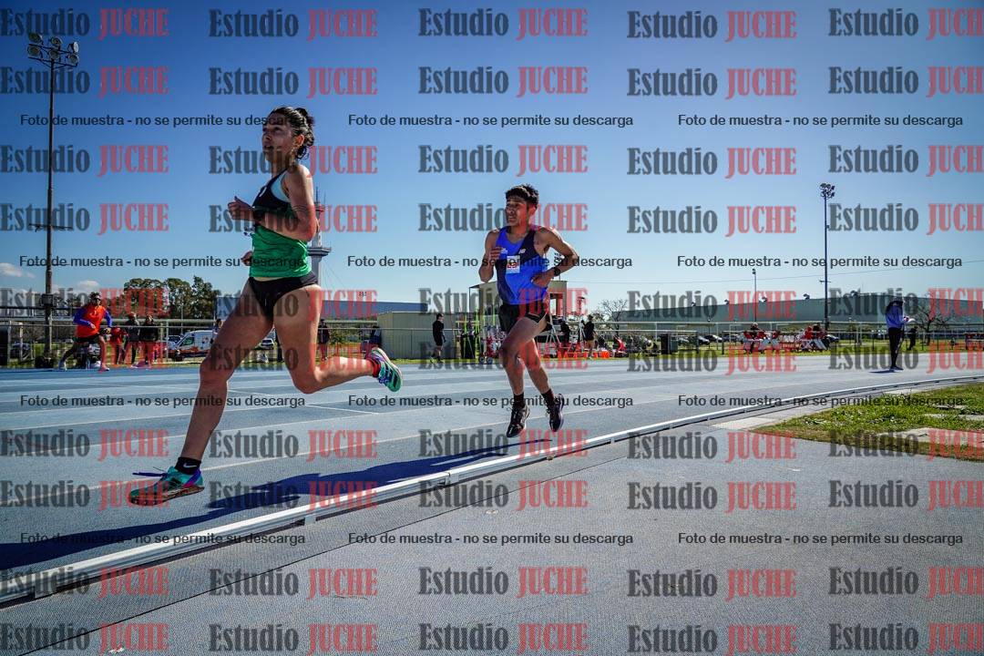 Fotos de los 5000 m llanos de mujeres y varones