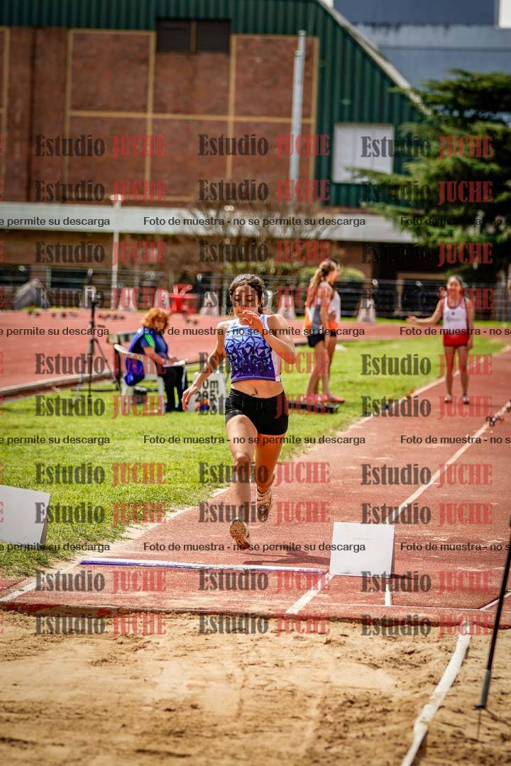 Fotos del salto en largo de mujeres