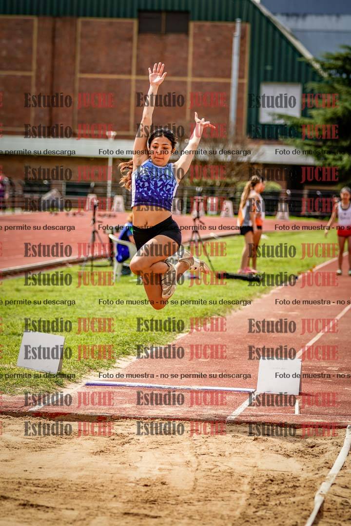 Fotos del salto en largo de mujeres