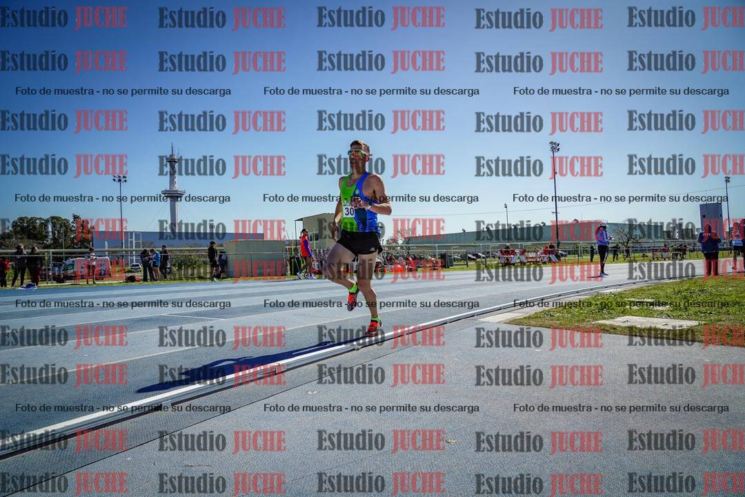 Fotos de los 5000 m llanos de mujeres y varones