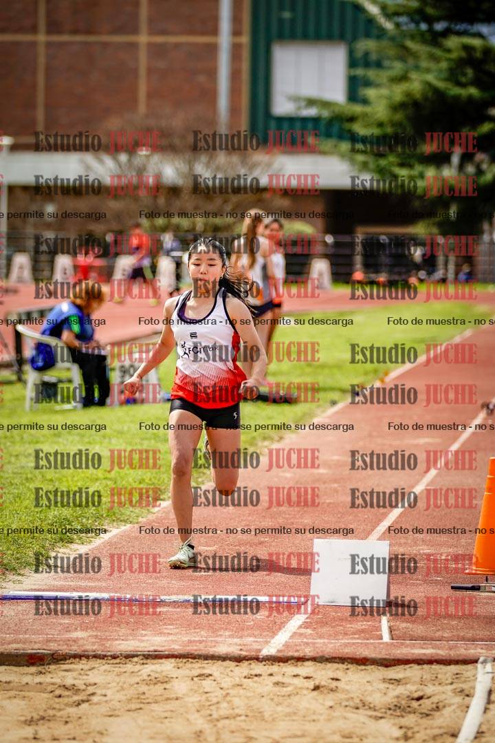 Fotos del salto en largo de mujeres