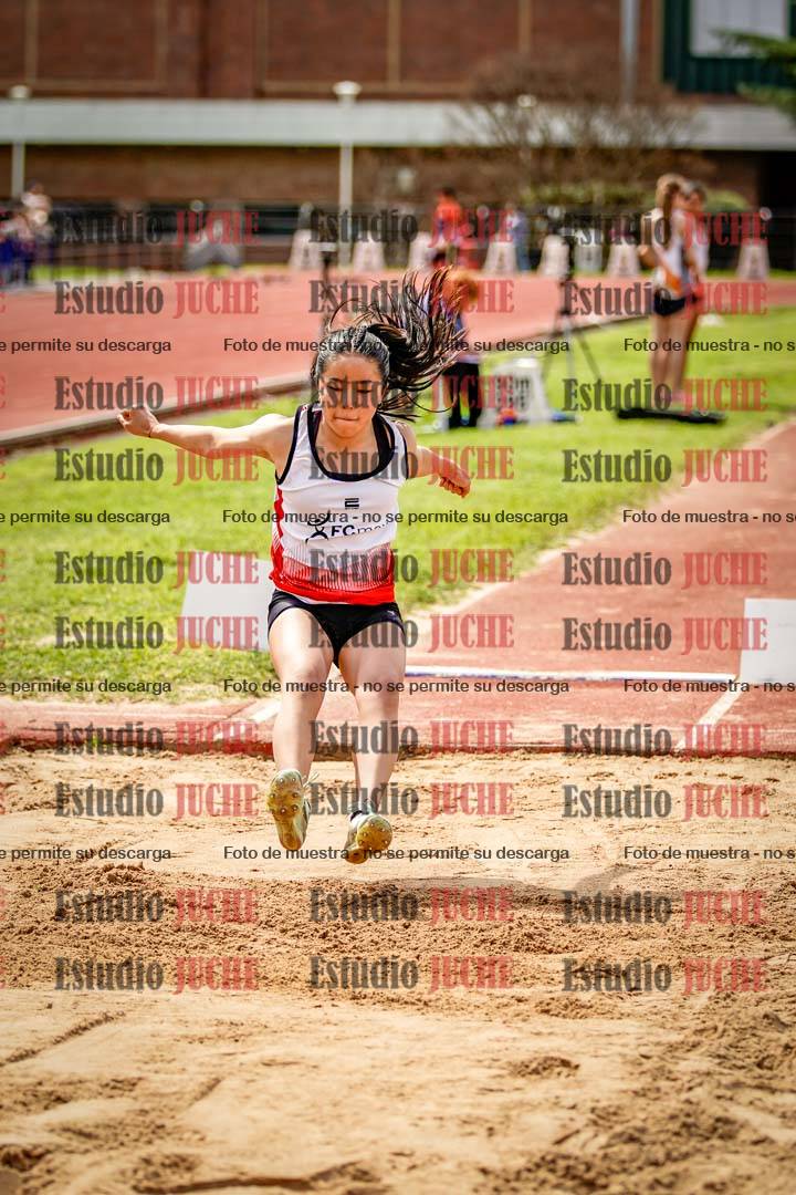 Fotos del salto en largo de mujeres