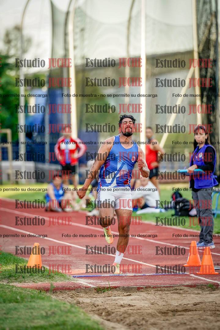 Fotos del salto en largo de varones